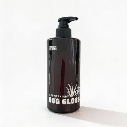 Black bottle of 'Dog Gloss' with a pump on a white background
